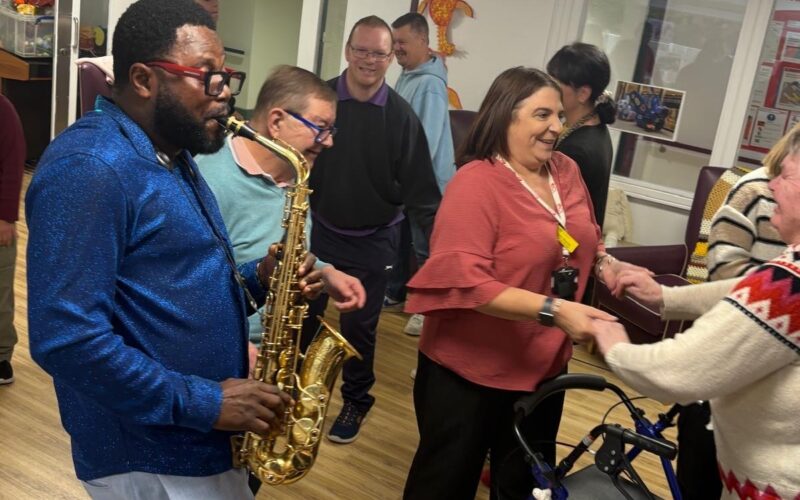 ECL customers and staff enjoying Mike's performance.