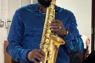 Jazz Saxophonist Mike Aremu playing the saxophone at ECL Chelmsford Day Centre.