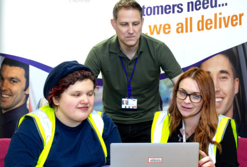 Inclusive Employment candidate with employer and Inclusive Employment Consultant