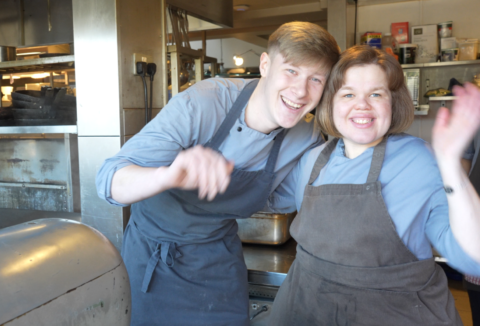 Young lady with hearing impairment working at pub and restaurant, The Lion Inn