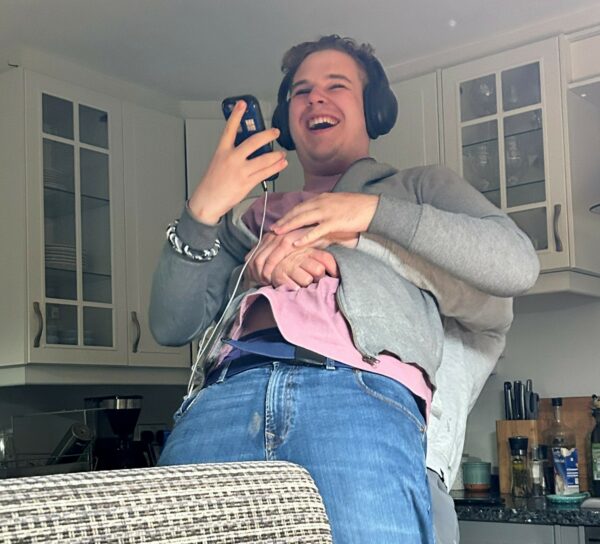 Young man with autism enjoying interaction with a friend