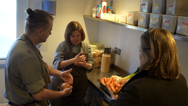 Sarah communucates with a colleague