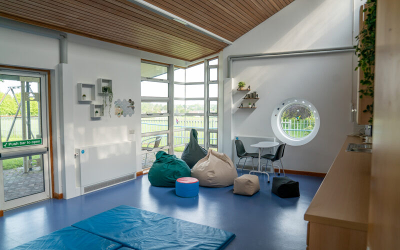 A second therapy room at Braintree day centre. A light bright room with floor mats and bean bags