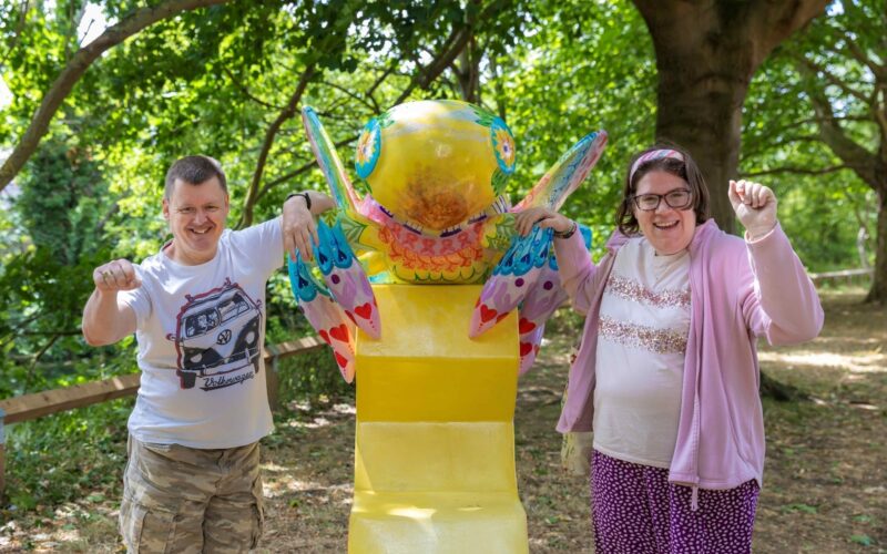 ECL Customers Lorna and Craig with one of the Buzz in the City large bee sculptures in Chelmsford.