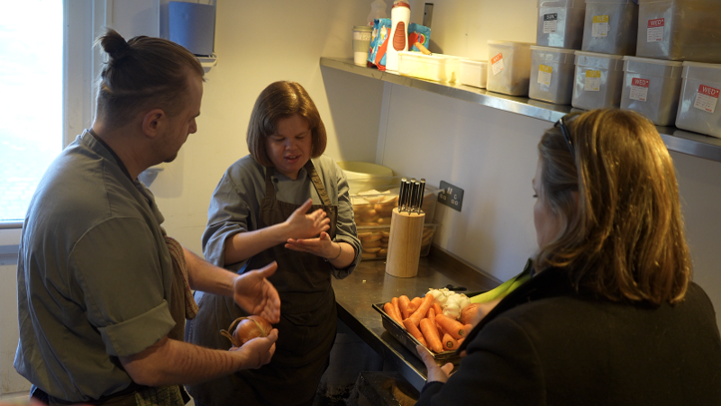 Sarah communucates with a colleague