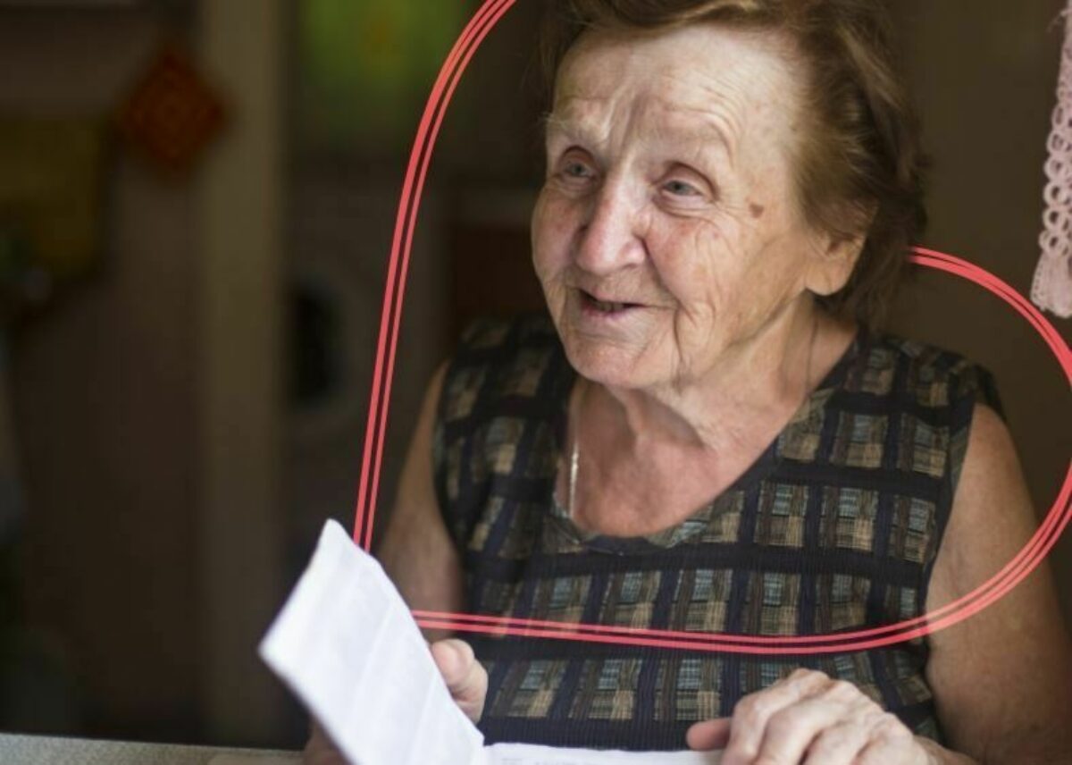 An elderly woman smiling
