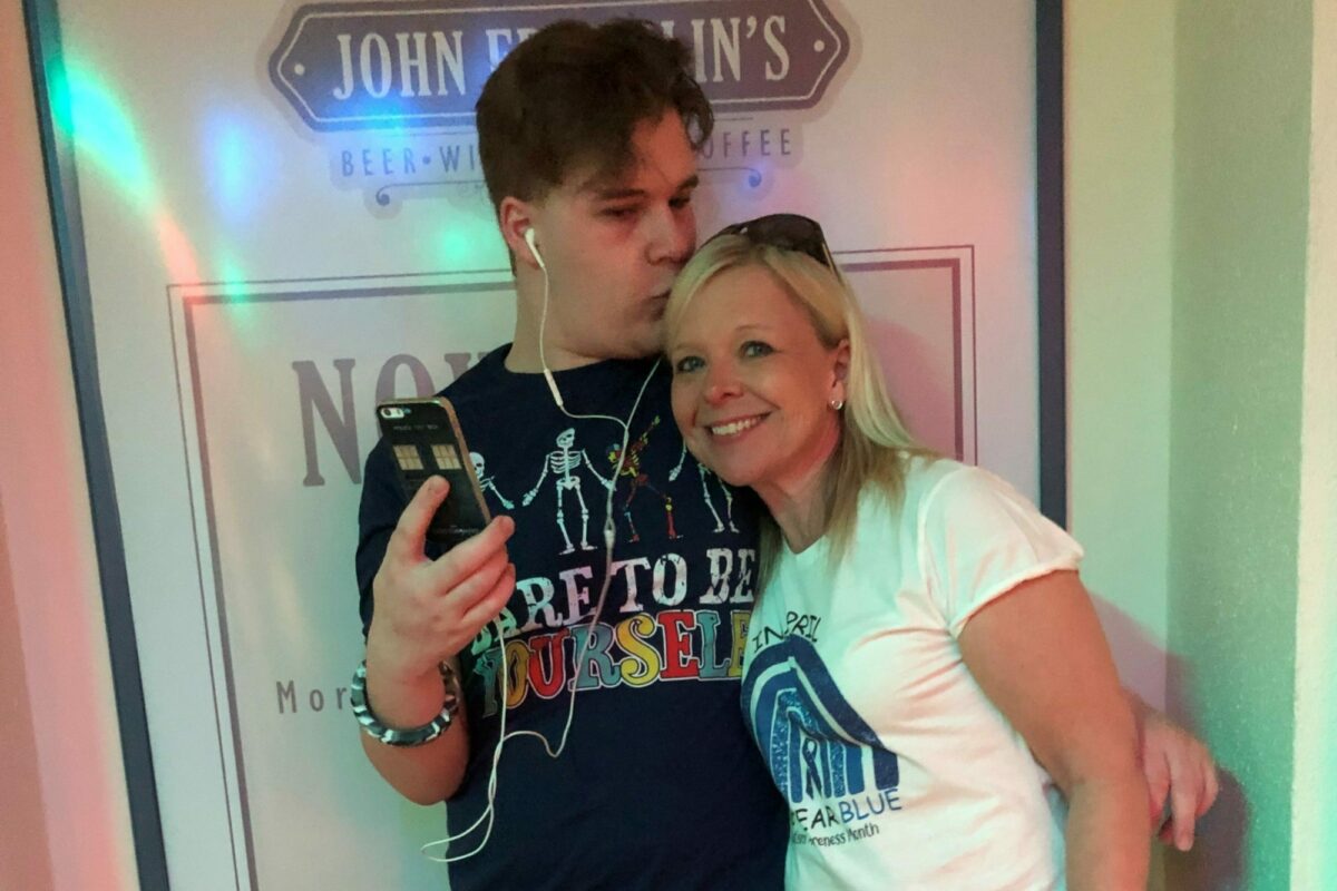 A man and a woman smiling