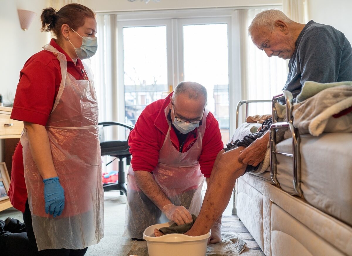Care Assistant Vanessa The Mayor and customer Roy SMALL