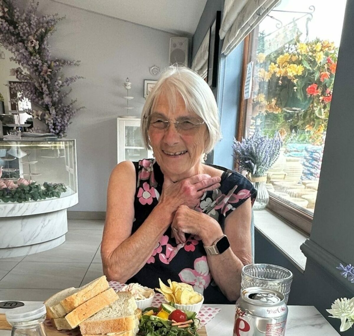 ECL customer Gill enjoying afternoon tea.