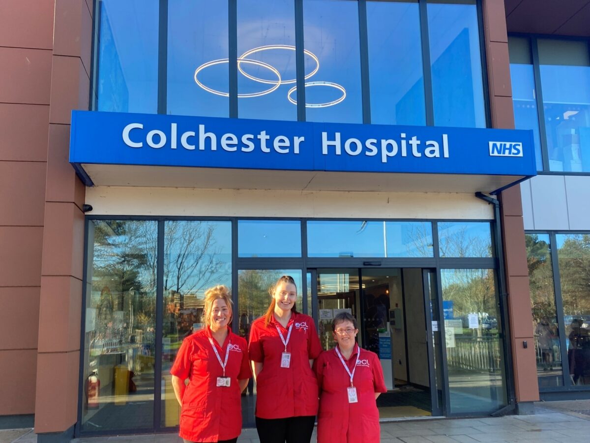 3 Employees  standing outside Colchester Hospital