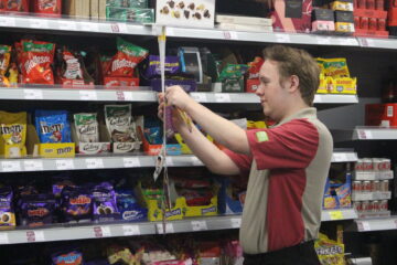 A man working in a shop.