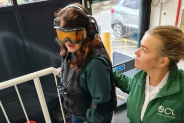 2 people walking up stairs