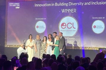 The ECL Inclusive Employment team being presented with their MJ Award.