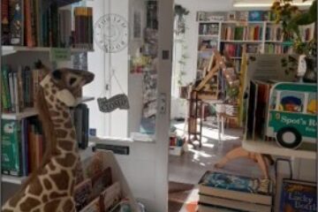 Interior of Maldon Books before sensory access audit view of the shop floor which is cluttered.