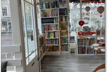 Interior photo of Maldon Books after the accessibility improvements - view of the left hand side of the store with a view of the children's book shelves.