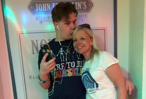 A man and a woman smiling