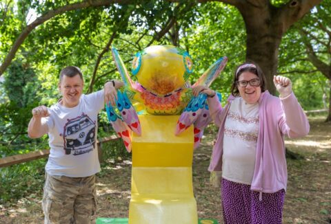 ECL Customers Lorna and Craig with one of the Buzz in the City large bee sculptures in Chelmsford.