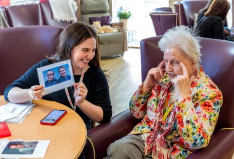 Support working and customer doing a reminiscence session