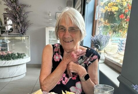ECL customer Gill enjoying afternoon tea.