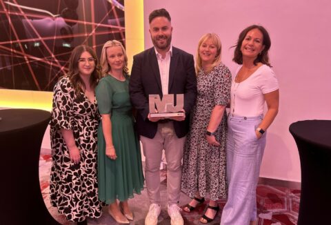 ECL's Inclusive Employment team with their MJ Award for Innovation in Building Diversity and Inclusion.