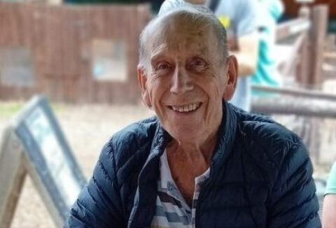 Alan smiling at the camera