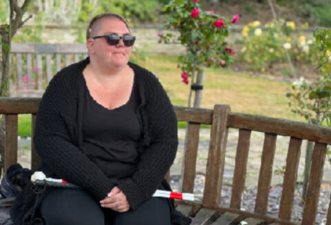 A woman sat on a bench